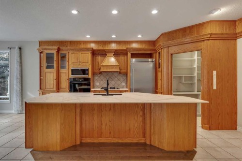 52 Sandstone Ridge Crescent, Okotoks, AB - Indoor Photo Showing Kitchen