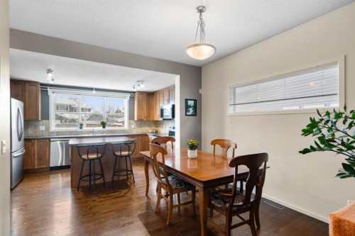 46 River Heights Boulevard, Cochrane, AB - Indoor Photo Showing Dining Room