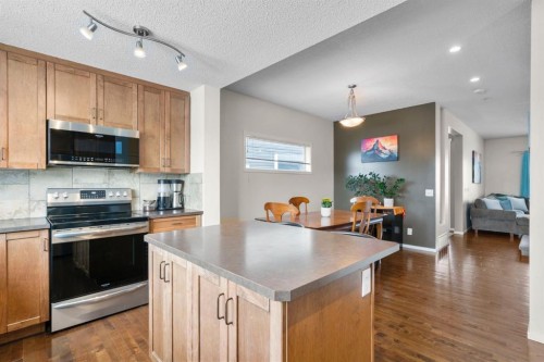 46 River Heights Boulevard, Cochrane, AB - Indoor Photo Showing Kitchen