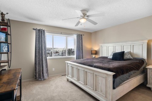 46 River Heights Boulevard, Cochrane, AB - Indoor Photo Showing Bedroom