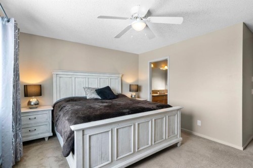 46 River Heights Boulevard, Cochrane, AB - Indoor Photo Showing Bedroom