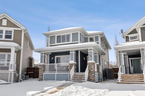 46 River Heights Boulevard, Cochrane, AB - Outdoor With Deck Patio Veranda With Facade
