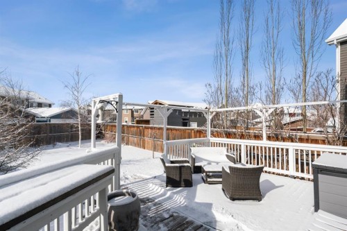 46 River Heights Boulevard, Cochrane, AB - Outdoor With Deck Patio Veranda