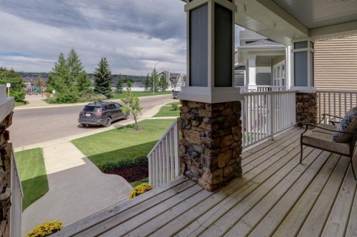 46 River Heights Boulevard, Cochrane, AB - Outdoor With Deck Patio Veranda