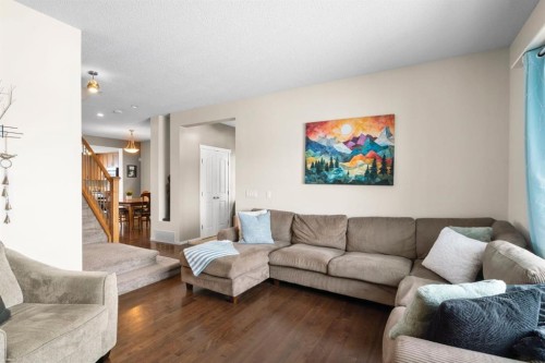 46 River Heights Boulevard, Cochrane, AB - Indoor Photo Showing Living Room