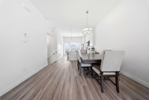 505-101 Panatella Square Nw, Calgary, AB - Indoor Photo Showing Dining Room