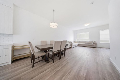 505-101 Panatella Square Nw, Calgary, AB - Indoor Photo Showing Dining Room