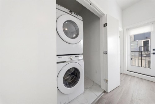 505-101 Panatella Square Nw, Calgary, AB - Indoor Photo Showing Laundry Room