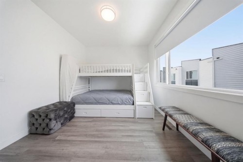 505-101 Panatella Square Nw, Calgary, AB - Indoor Photo Showing Bedroom