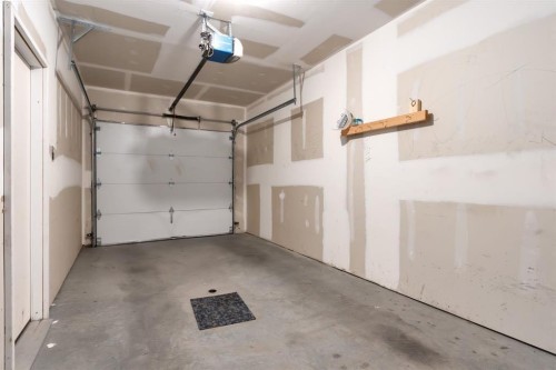 505-101 Panatella Square Nw, Calgary, AB - Indoor Photo Showing Garage