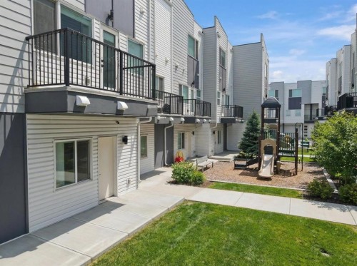 505-101 Panatella Square Nw, Calgary, AB - Outdoor With Balcony