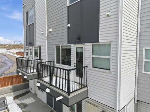 505-101 Panatella Square Nw, Calgary, AB - Outdoor With Exterior