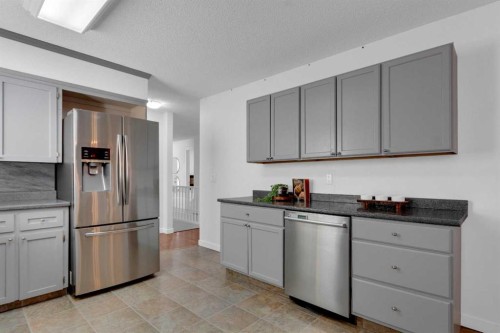 11 Woodfield Crescent Sw, Calgary, AB - Indoor Photo Showing Kitchen With Stainless Steel Kitchen