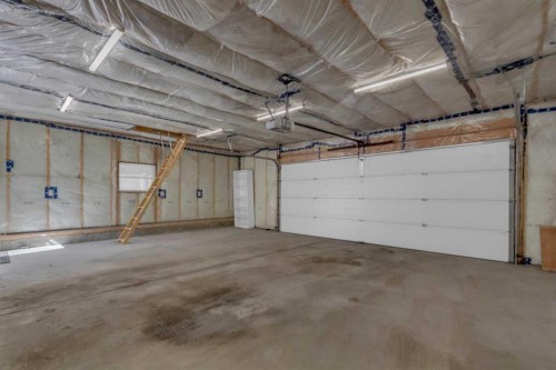 11 Woodfield Crescent Sw, Calgary, AB - Indoor Photo Showing Garage
