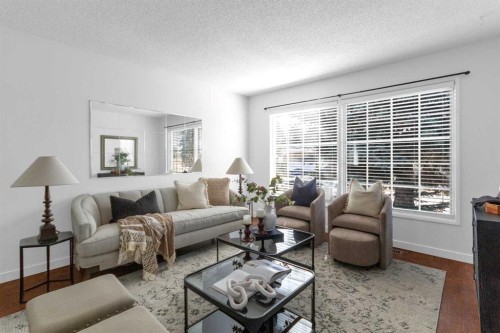 11 Woodfield Crescent Sw, Calgary, AB - Indoor Photo Showing Living Room