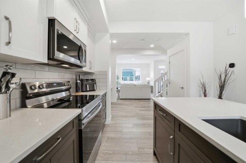 171 Wolf Creek Avenue Se, Calgary, AB - Indoor Photo Showing Kitchen With Upgraded Kitchen