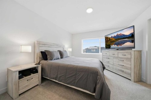 171 Wolf Creek Avenue Se, Calgary, AB - Indoor Photo Showing Bedroom