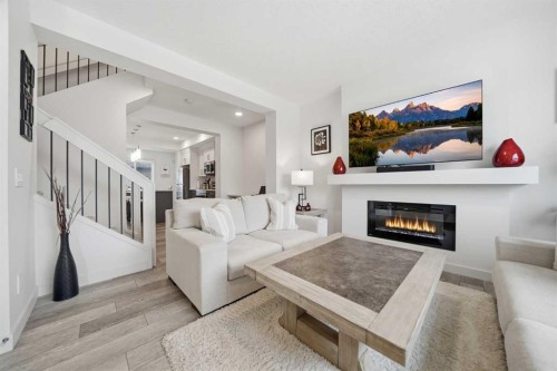 171 Wolf Creek Avenue Se, Calgary, AB - Indoor Photo Showing Living Room With Fireplace