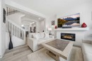 171 Wolf Creek Avenue Se, Calgary, AB  - Indoor Photo Showing Living Room With Fireplace 