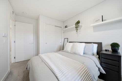 171 Wolf Creek Avenue Se, Calgary, AB - Indoor Photo Showing Bedroom