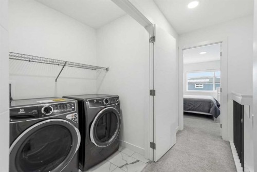 171 Wolf Creek Avenue Se, Calgary, AB - Indoor Photo Showing Laundry Room