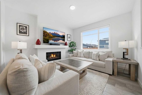171 Wolf Creek Avenue Se, Calgary, AB - Indoor Photo Showing Living Room With Fireplace