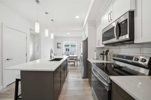 171 Wolf Creek Avenue Se, Calgary, AB - Indoor Photo Showing Kitchen With Upgraded Kitchen