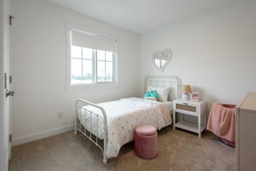 517 Ranch Gate, Strathmore, AB - Indoor Photo Showing Bedroom