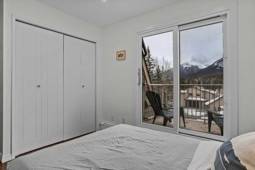 214-200 Three Sisters Drive, Canmore, AB - Indoor Photo Showing Bedroom