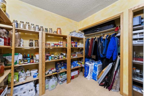 25 Westheights Drive, Didsbury, AB - Indoor With Storage
