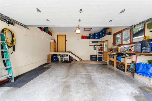 25 Westheights Drive, Didsbury, AB - Indoor Photo Showing Garage