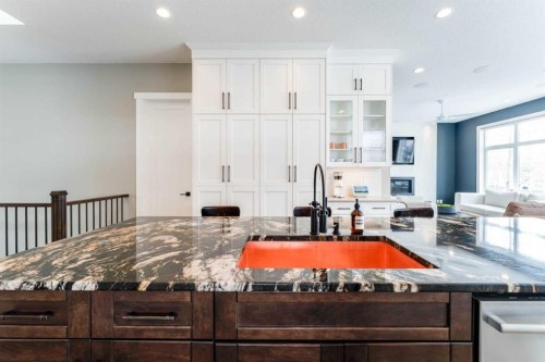 102 Coopersfield Way Sw, Airdrie, AB - Indoor Photo Showing Kitchen With Upgraded Kitchen