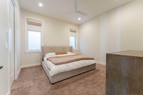 102 Coopersfield Way Sw, Airdrie, AB - Indoor Photo Showing Bedroom