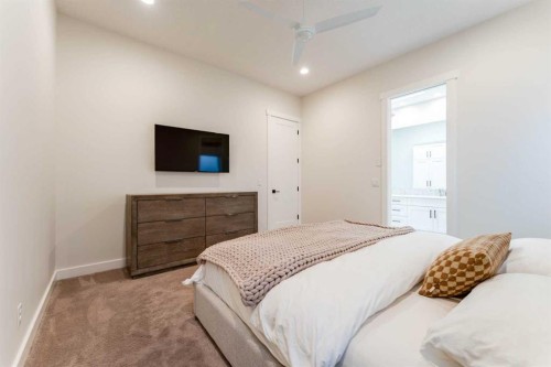 102 Coopersfield Way Sw, Airdrie, AB - Indoor Photo Showing Bedroom