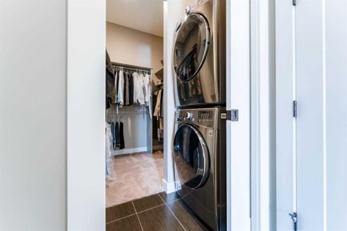 102 Coopersfield Way Sw, Airdrie, AB - Indoor Photo Showing Laundry Room