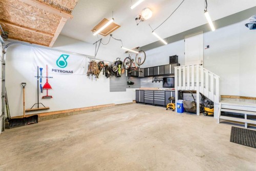 102 Coopersfield Way Sw, Airdrie, AB - Indoor Photo Showing Garage