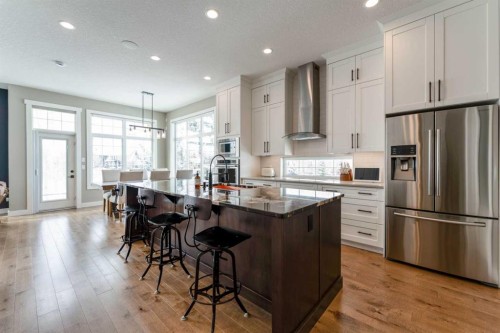 102 Coopersfield Way Sw, Airdrie, AB - Indoor Photo Showing Kitchen With Upgraded Kitchen