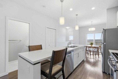 44 Copperstone Common Se, Calgary, AB - Indoor Photo Showing Kitchen With Double Sink With Upgraded Kitchen
