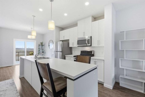 44 Copperstone Common Se, Calgary, AB - Indoor Photo Showing Kitchen With Stainless Steel Kitchen With Double Sink