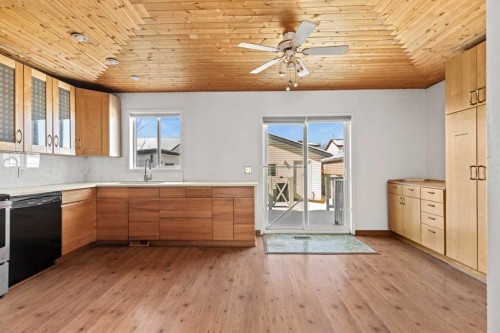148 Martin Crossing Crescent Ne, Calgary, AB - Indoor Photo Showing Kitchen With Double Sink
