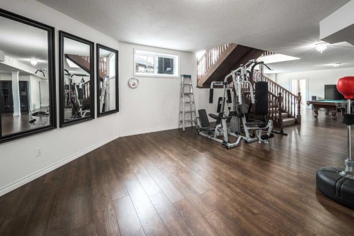 5 Elveden Point Sw, Calgary, AB - Indoor Photo Showing Gym Room