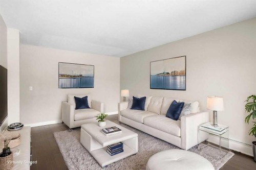 301-4455A Greenview Drive Ne, Calgary, AB - Indoor Photo Showing Living Room