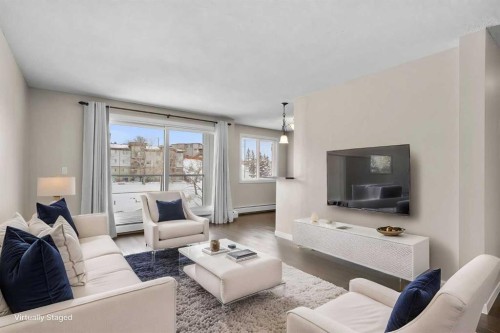 301-4455A Greenview Drive Ne, Calgary, AB - Indoor Photo Showing Living Room