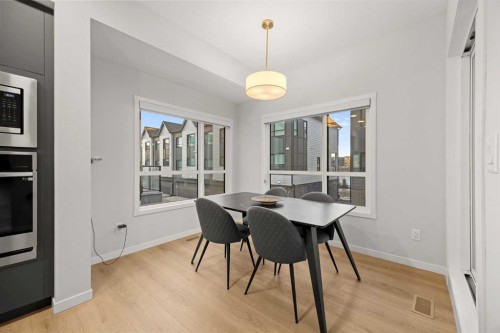 617-20295 Seton Way Se, Calgary, AB - Indoor Photo Showing Dining Room