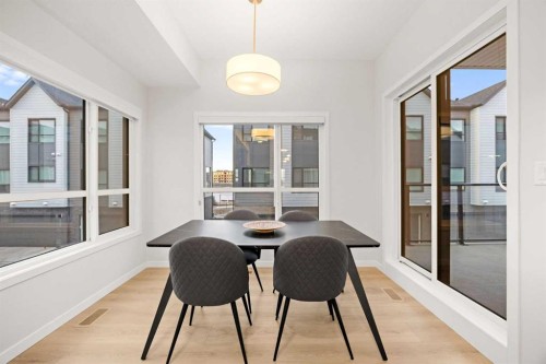 617-20295 Seton Way Se, Calgary, AB - Indoor Photo Showing Dining Room