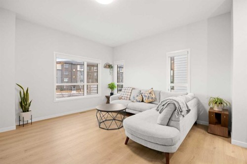 617-20295 Seton Way Se, Calgary, AB - Indoor Photo Showing Living Room