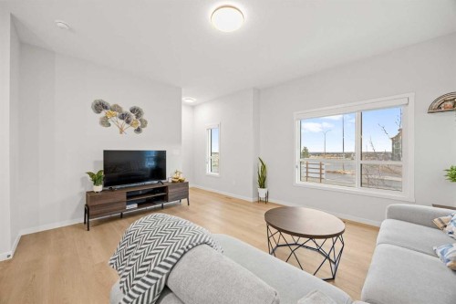 617-20295 Seton Way Se, Calgary, AB - Indoor Photo Showing Living Room