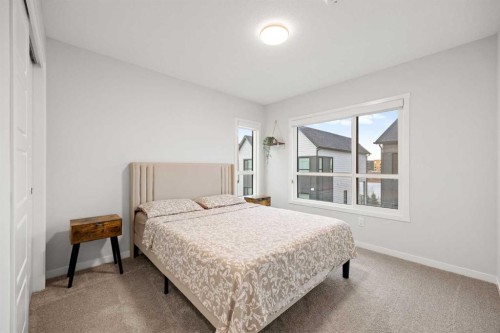 617-20295 Seton Way Se, Calgary, AB - Indoor Photo Showing Bedroom
