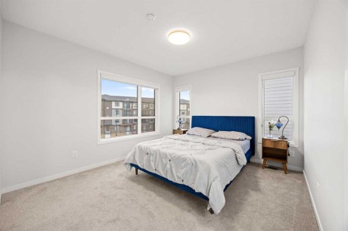 617-20295 Seton Way Se, Calgary, AB - Indoor Photo Showing Bedroom