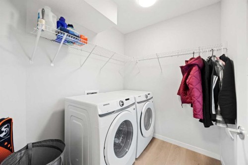 617-20295 Seton Way Se, Calgary, AB - Indoor Photo Showing Laundry Room